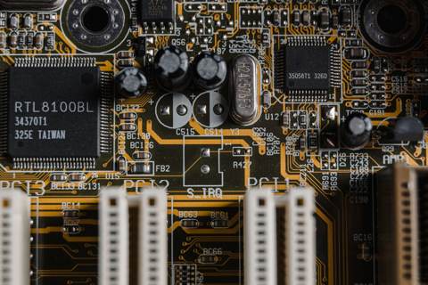 NXP Semiconductors, Universal Display Shares Slide